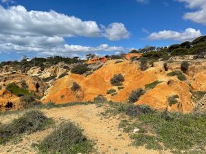 Hiking trail in Algarve, orange sand